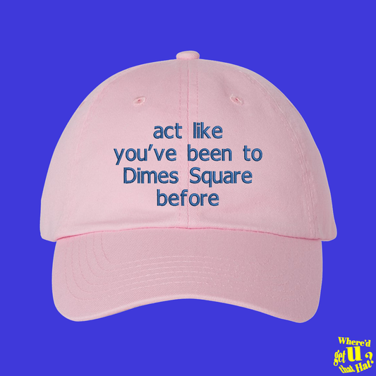 a pink hat with the words act like you've been to dimes square